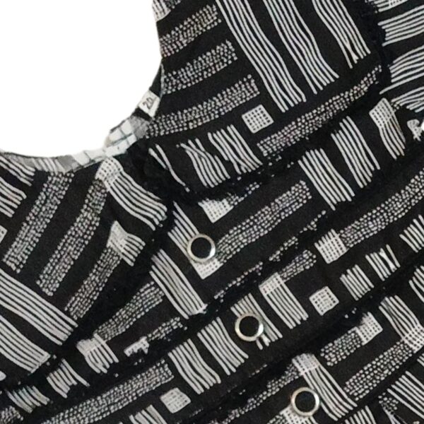 Long Sleeve Baby Dress with Trouser Set in Colorful Black Patterns - Image 2